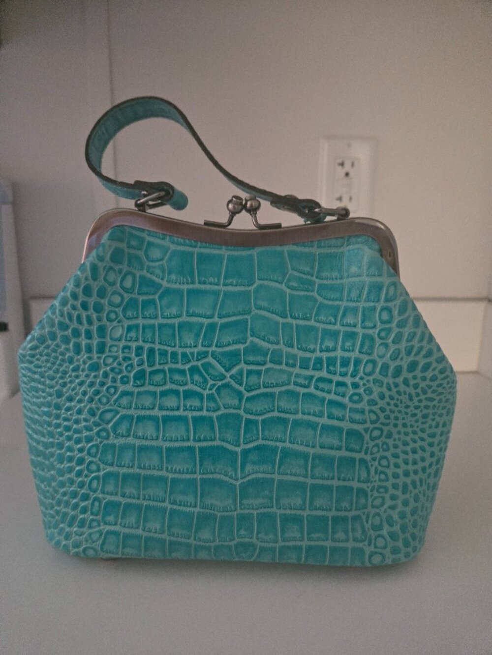 Pretty teal leather handbag